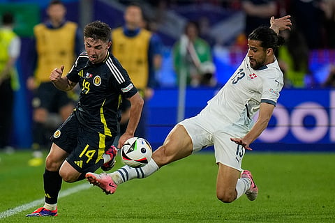 Ricardo Rodriguez fouls Scotland's Billy Gilmour 